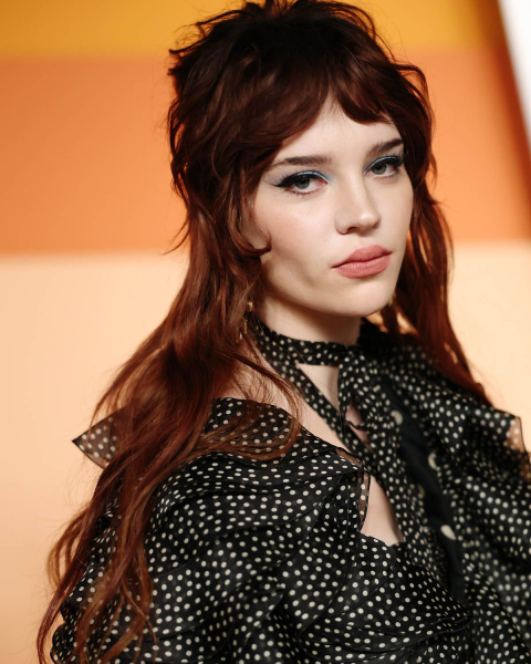 dark romance hair trend 2026 sophie thatcher layered tousled hair