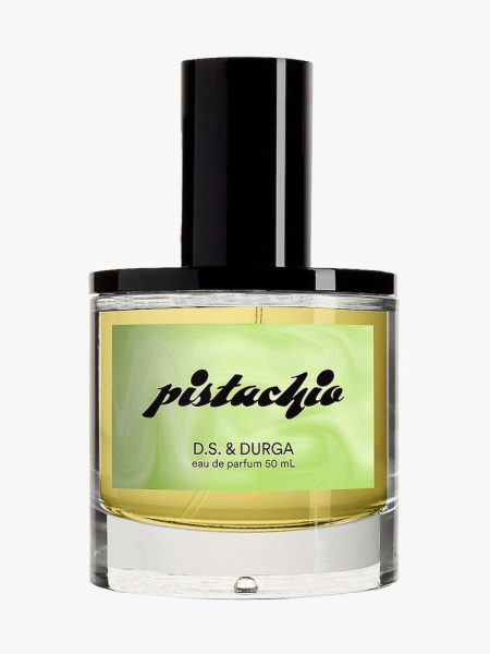 D.S. & Durga Pistachio Eau de Parfum bottle of green perfume with black cap on light gray background